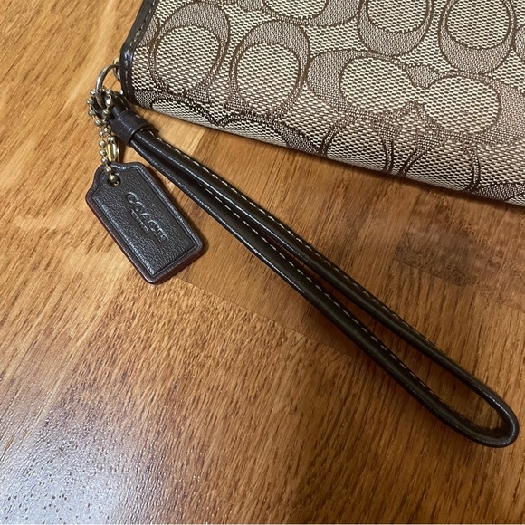 Coach Signature Canvas Zip Around Wristlet - Picture 4 of 13